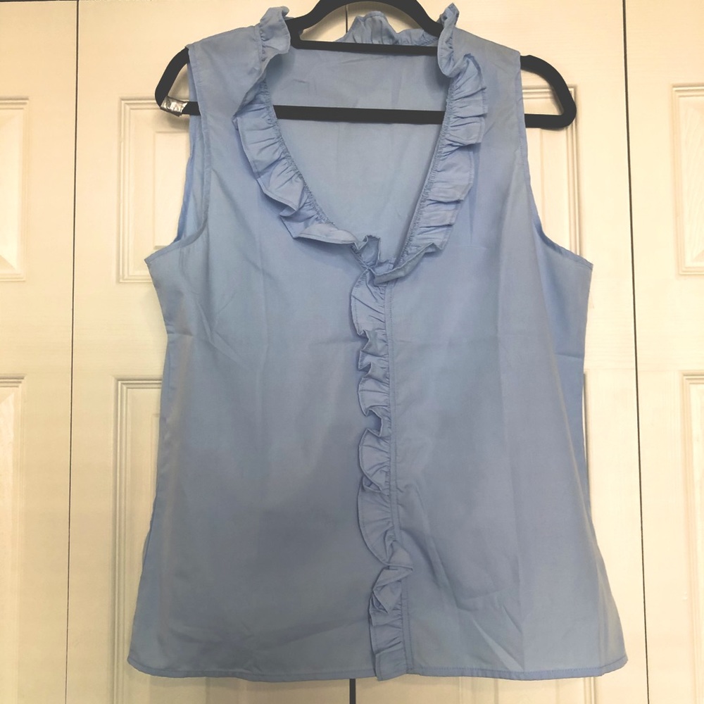 Baby blue ruffle trim sleeveless top.
